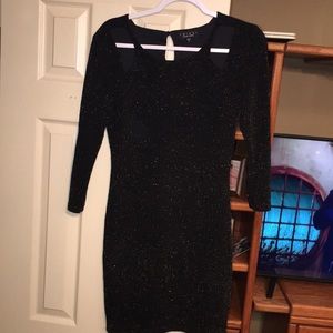 Fitted sparkly black mini dress
